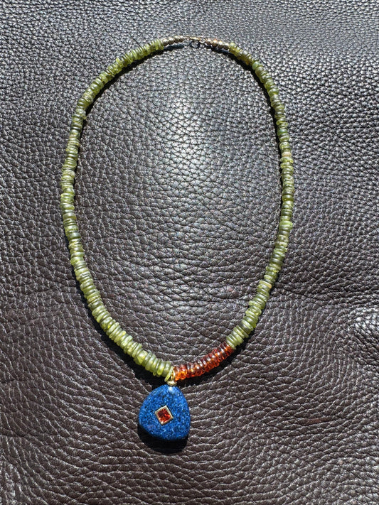 Color block with navy blue charm pendant