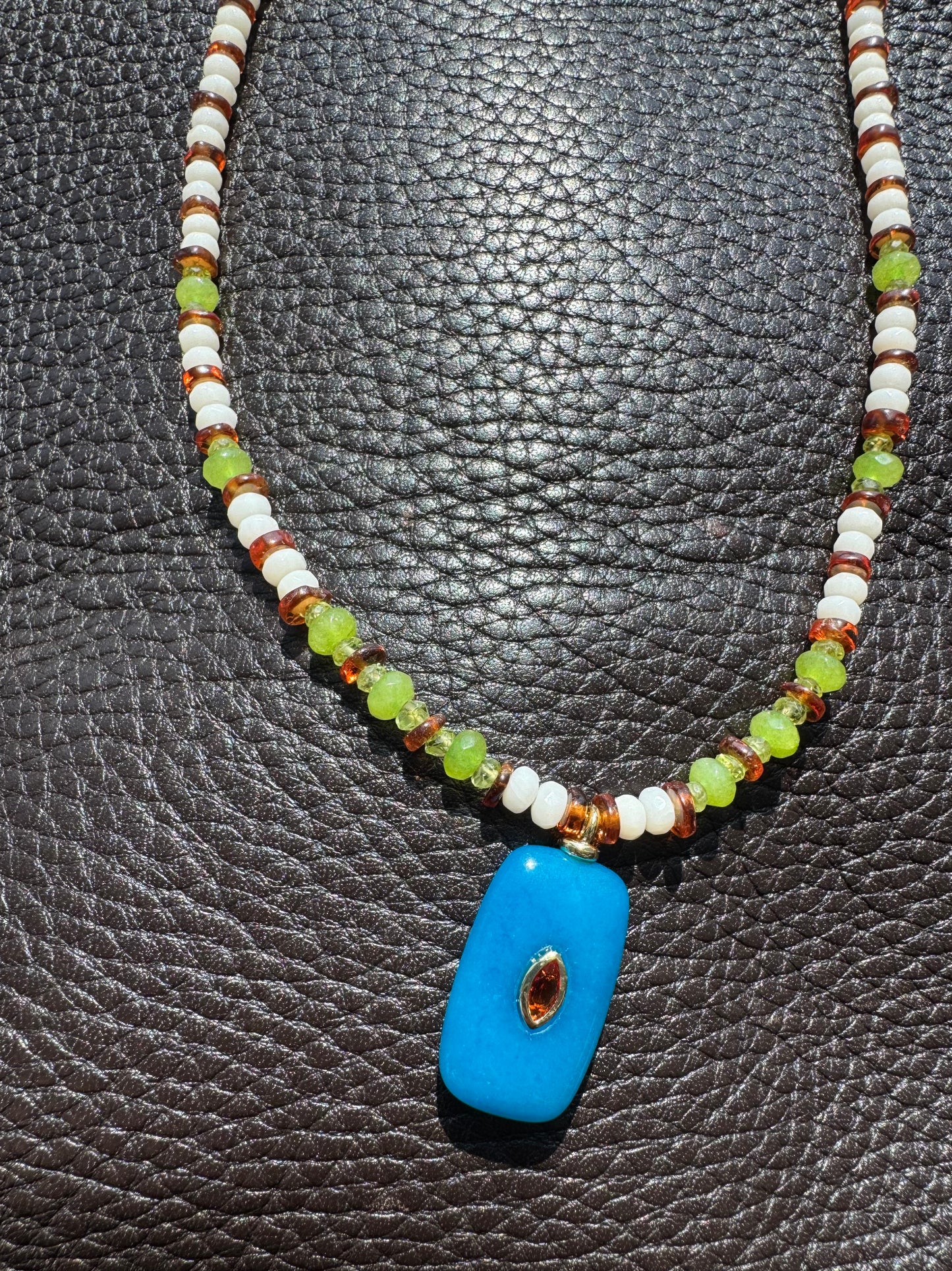 Mixed/white beads with blue charm pendant