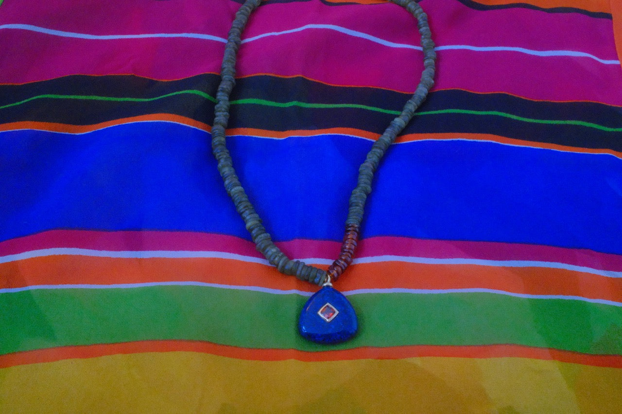 Color block with navy blue charm pendant