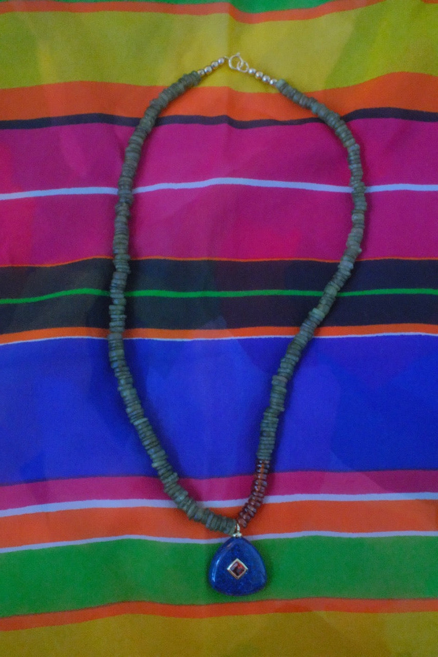 Color block with navy blue charm pendant