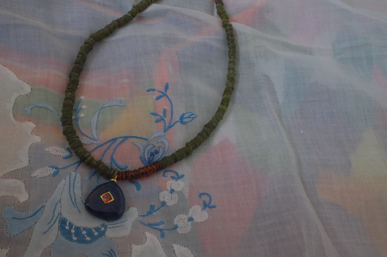 Color block with navy blue charm pendant