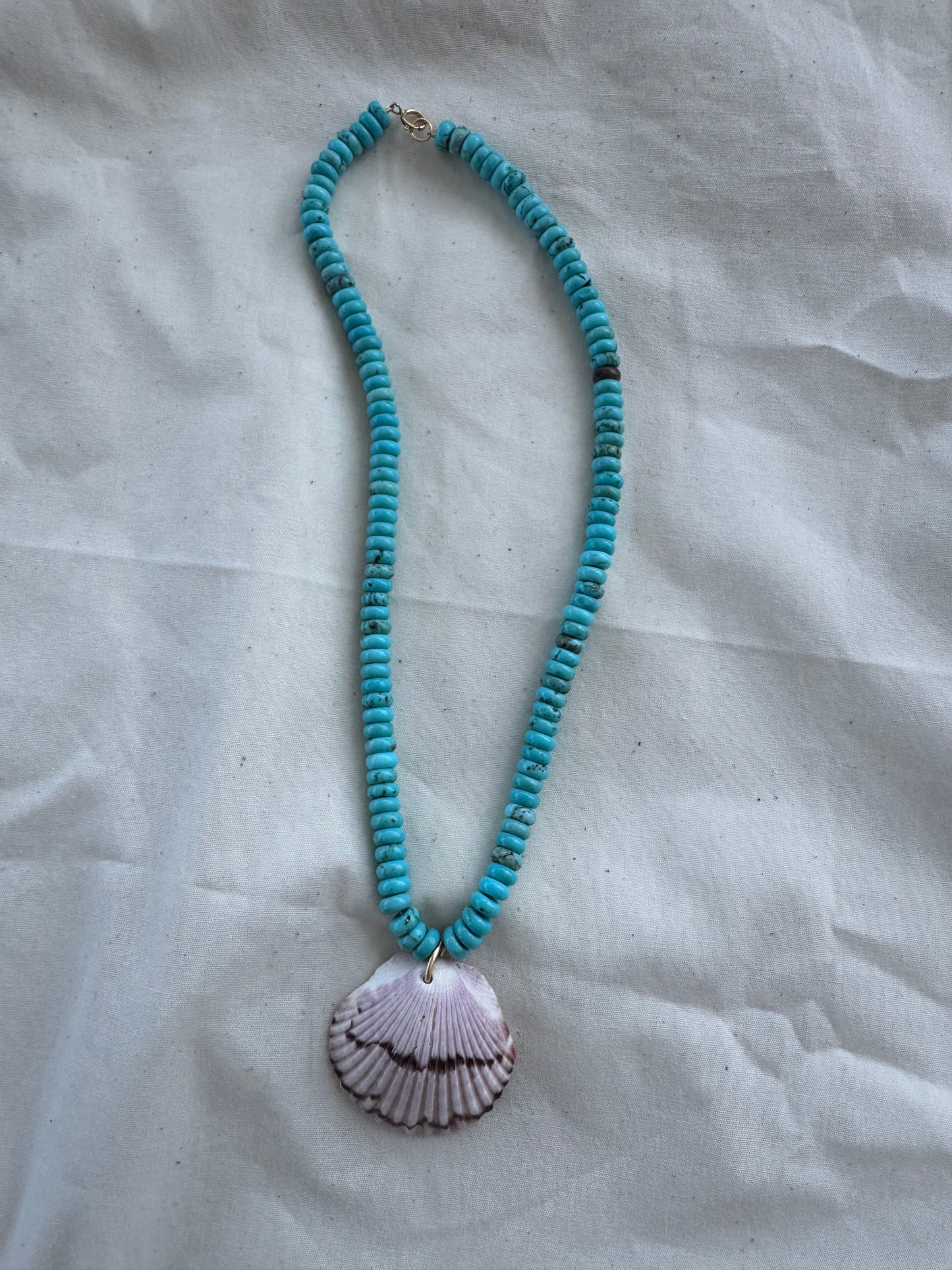 Turquoise beaded necklace with shell